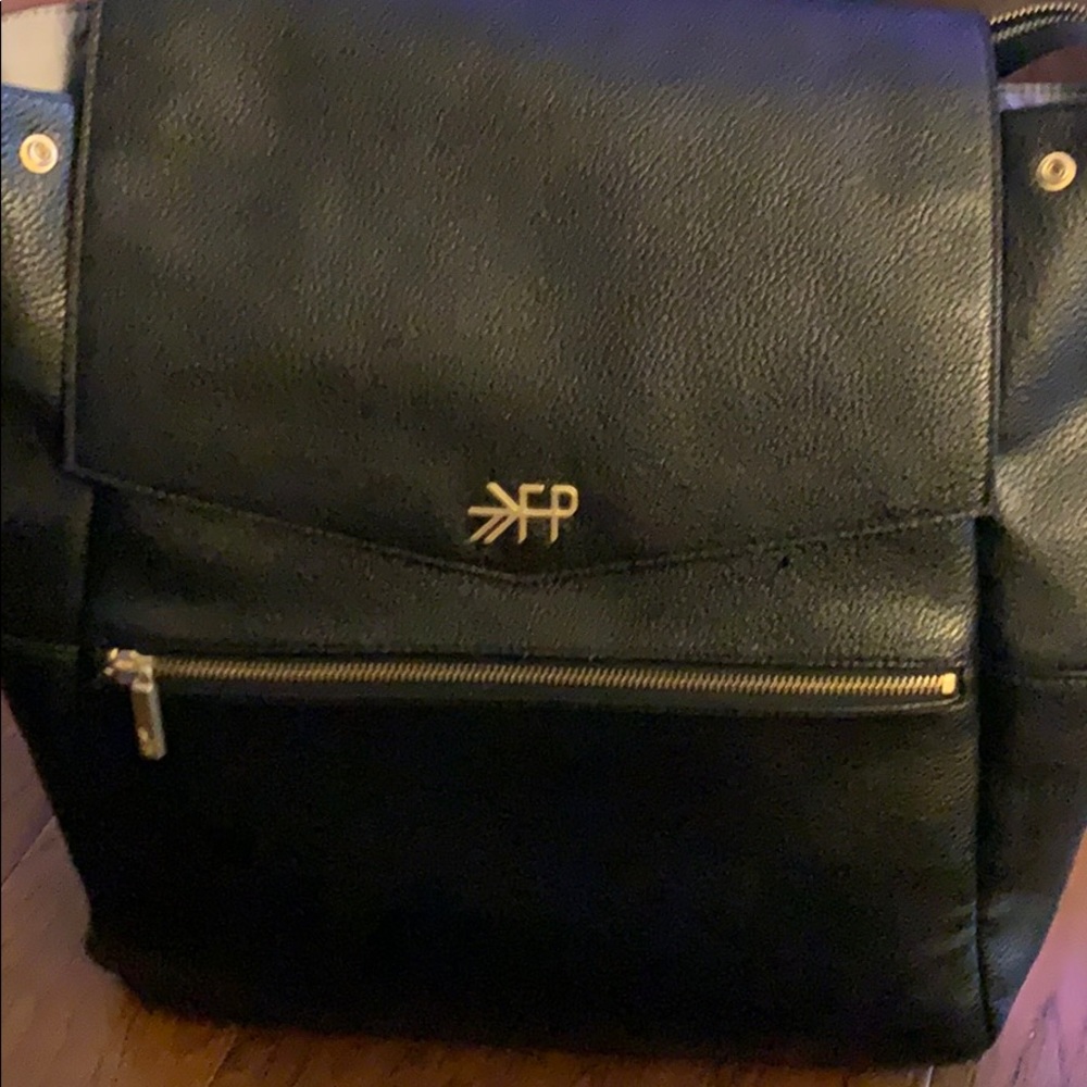 Freshly picked black leather backpack